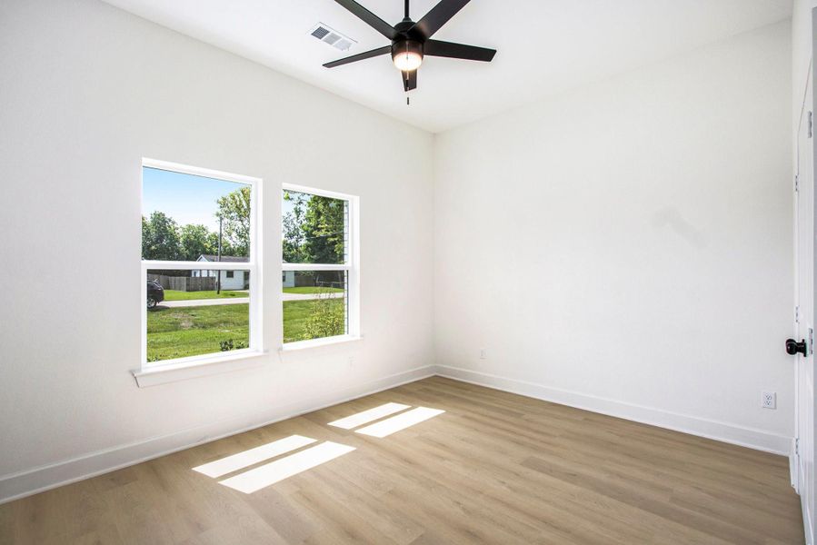 SECONDARY BEDROOM FRONT SECONDARY BEDROOM FRONT