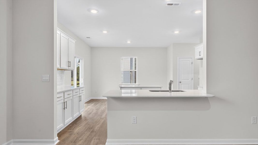 Furnished interior view inside a new home in Galvins Ridge, Sanford (Image 5).