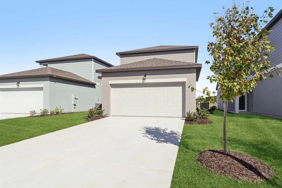 Representative exterior photo of a completed home built from the Keele by Starlight Homes in Hawks Run, Kissimmee, FL (Image 23).