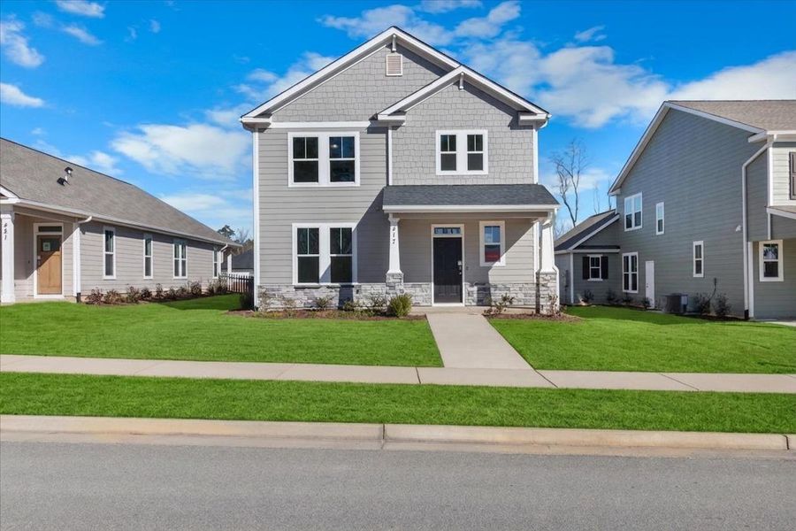 Front exterior of a new home in Tillery Park, Grovetown, GA, highlighting curb appeal (Image 1). Front exterior of a new home in Tillery Park, Grovetown, GA, highlighting curb appeal (Image 1).
