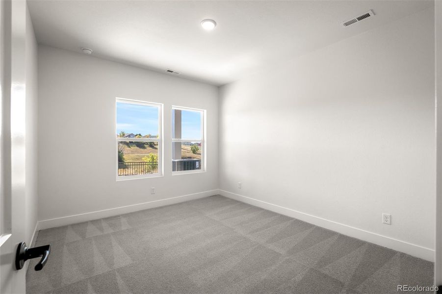 Spacious, unfurnished interior of a new home in Trailside at Cottonwood Creek, Colorado Springs (Image 33).