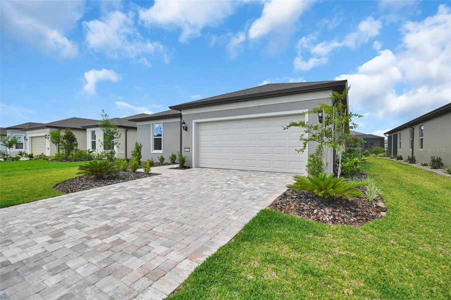 Front exterior of a new home in , Ocala, FL, highlighting curb appeal (Image 24).