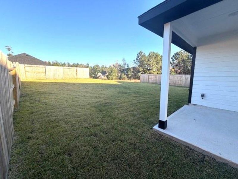 Exterior details and patio area of a home in Hills of Westlake, Conroe (Image 2). Exterior details and patio area of a home in Hills of Westlake, Conroe (Image 2).