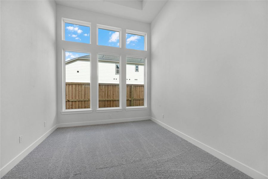 Spacious, unfurnished interior of a new home in Sienna, Missouri City (Image 11).
