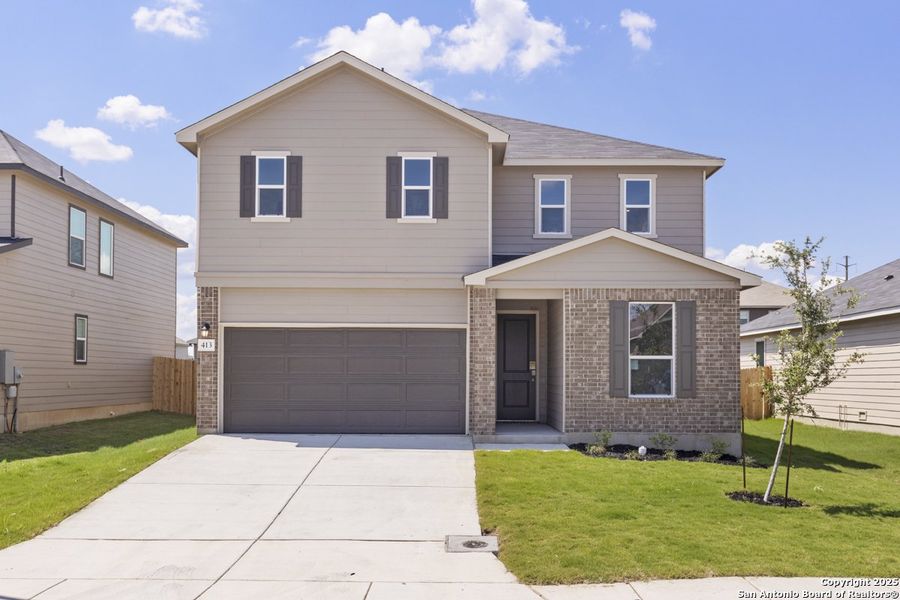 Front exterior of a new home in Woodside Farms, Seguin, TX, highlighting curb appeal (Image 1). Front exterior of a new home in Woodside Farms, Seguin, TX, highlighting curb appeal (Image 1).