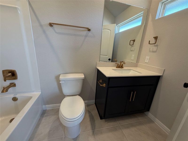 Furnished interior view inside a new home in Cannon Ranch 40s, Dripping Springs (Image 9).