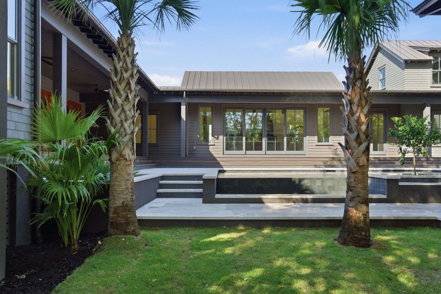Exterior details and patio area of a home in , Sullivan's Island (Image 20).