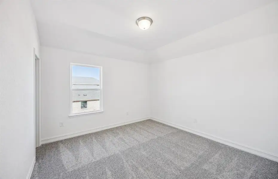 Inviting bedroom offering soft natural light Inviting bedroom offering soft natural light