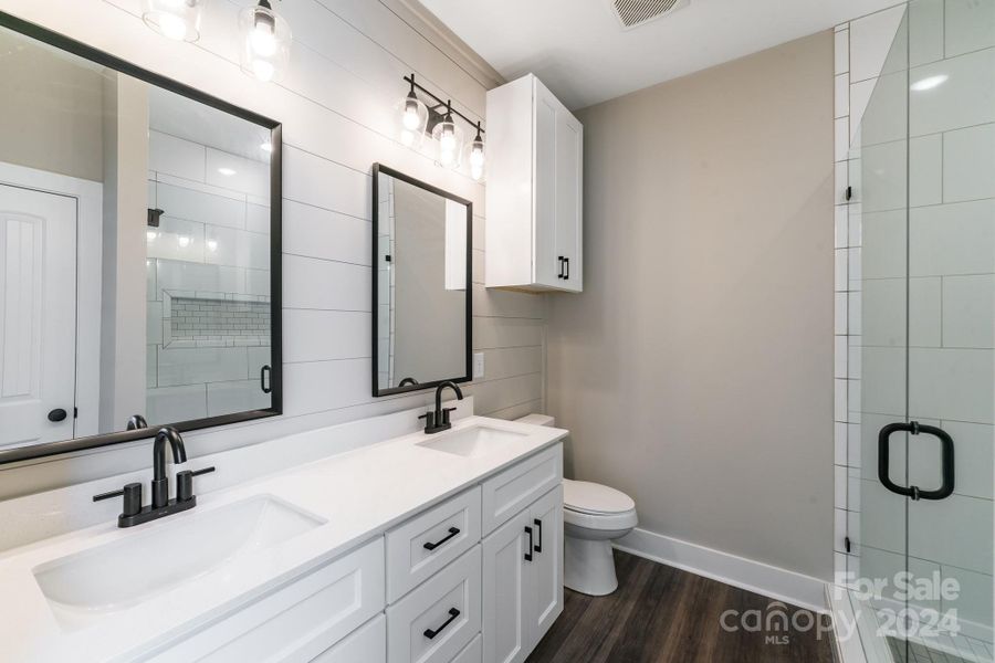 Primary Bathroom: ALL Pics are of Previous Builds and are For Visual Purposes Only. We have built this plan with many different added upgrades and add-on finishes for the Exterior and Interior. Final Price TBD based on the added cost of buyers' selected upgrades and finishes.