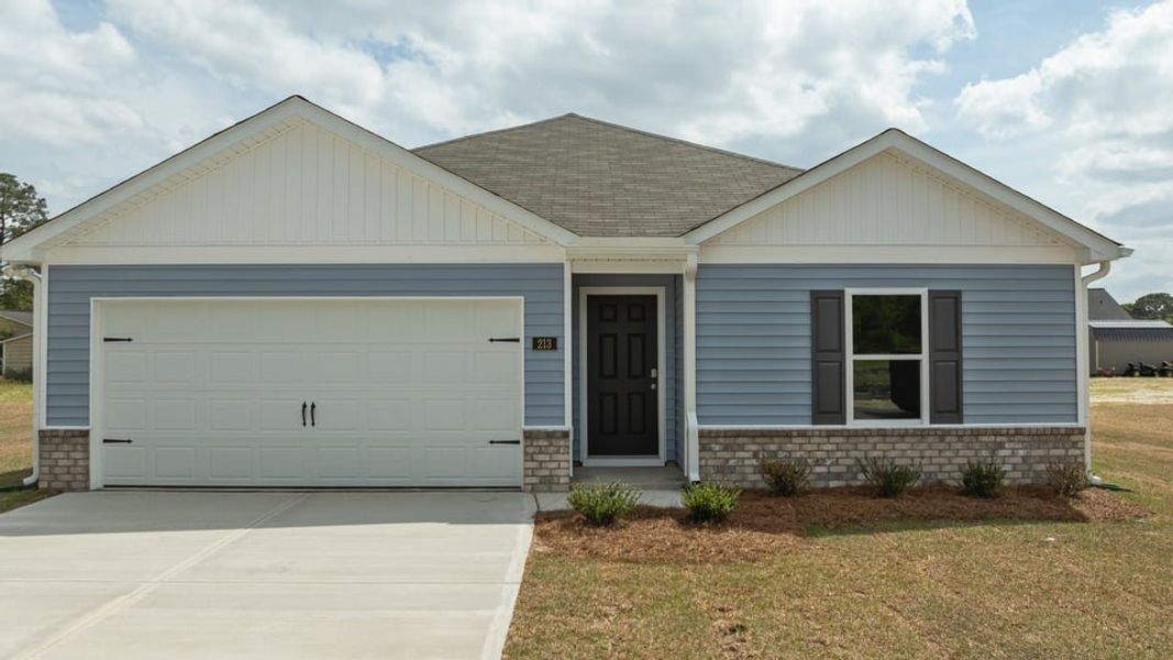 Front exterior of a new home in Collett Farm, Trinity, NC, highlighting curb appeal (Image 1). Front exterior of a new home in Collett Farm, Trinity, NC, highlighting curb appeal (Image 1).