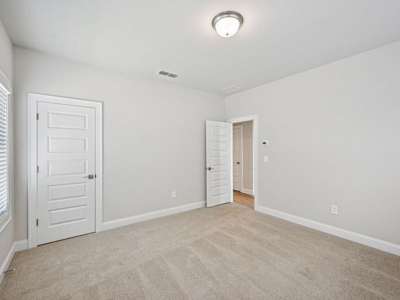 Spacious, unfurnished interior of a new home in Hemingway - Highland Series, Cumming (Image 15).