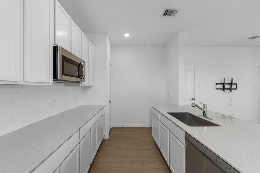 Furnished interior view inside a new home in Riverwood Ranch, Angleton (Image 8).