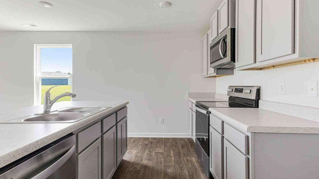 Representative furnished interior of a home built from the Devon by D.R. Horton in Eagle Creek, Bolivia (Image 7).