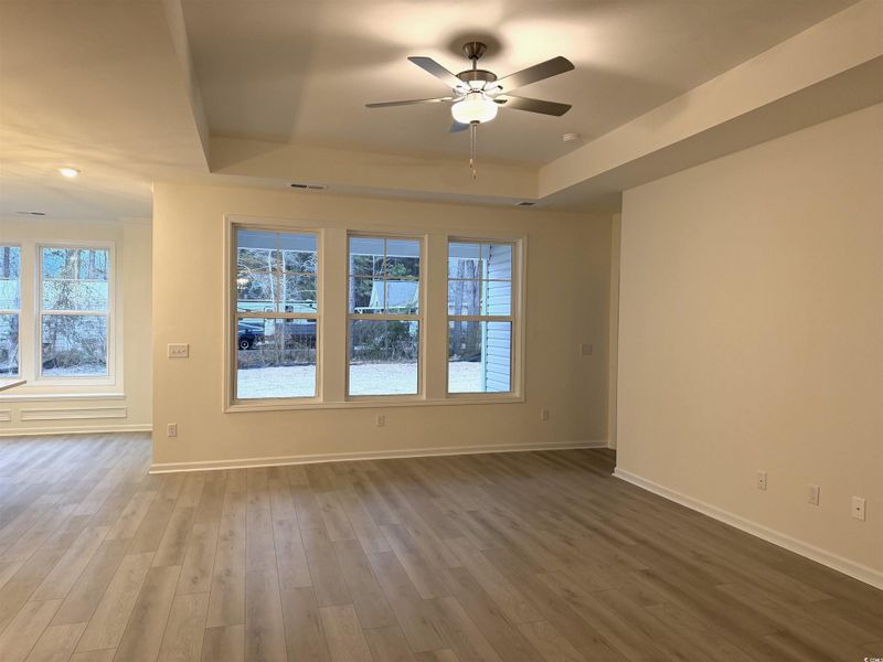 Doorway to outside featuring recessed lighting and wood finished floors