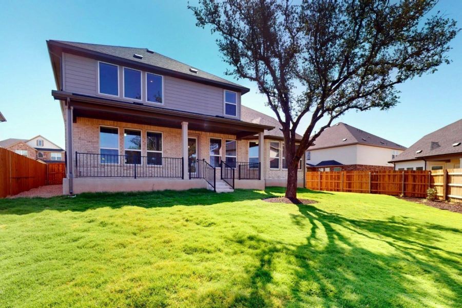 Front exterior of a new home in Edgewood, Leander, TX, highlighting curb appeal (Image 21). Front exterior of a new home in Edgewood, Leander, TX, highlighting curb appeal (Image 21).