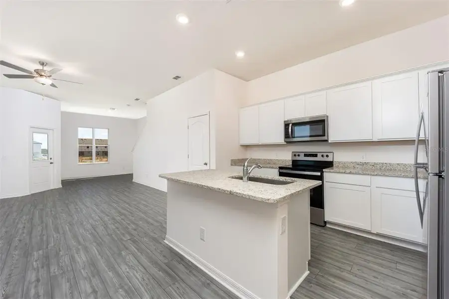 Furnished interior view inside a new home in Sol Vista, Dundee (Image 8).