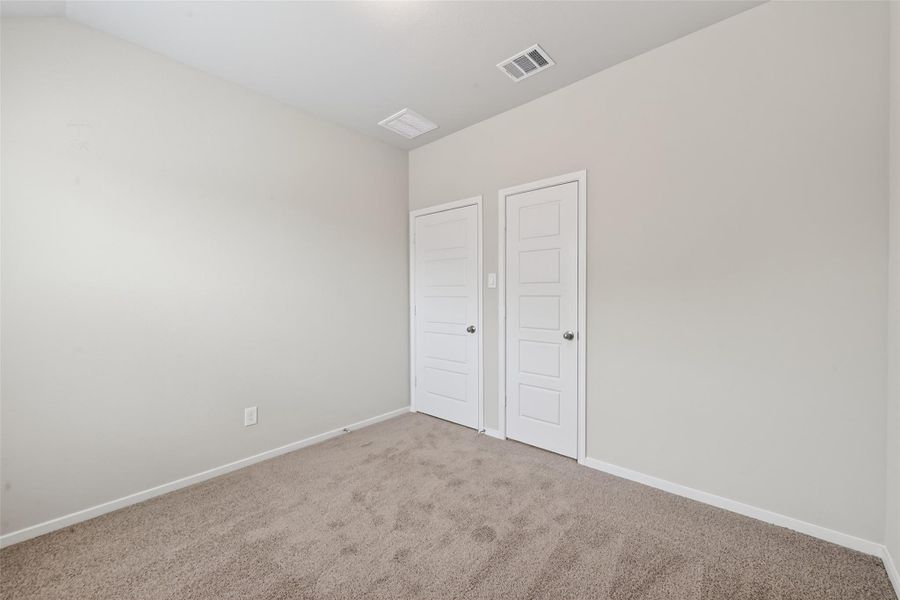Spacious, unfurnished interior of a new home in Sunterra, Katy (Image 36).
