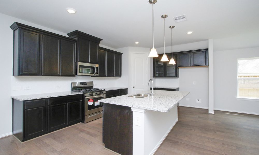Representative furnished interior of a home built from the Enclave Series - Fiji by DRB Homes in Meyer Ranch – Premier, New Braunfels (Image 16).