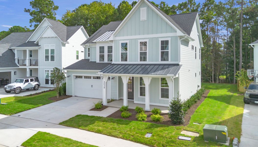 Representative exterior photo of a completed home built from the The Hampton by RobuckHomes in Stonehenge, Raleigh, NC (Image 43).