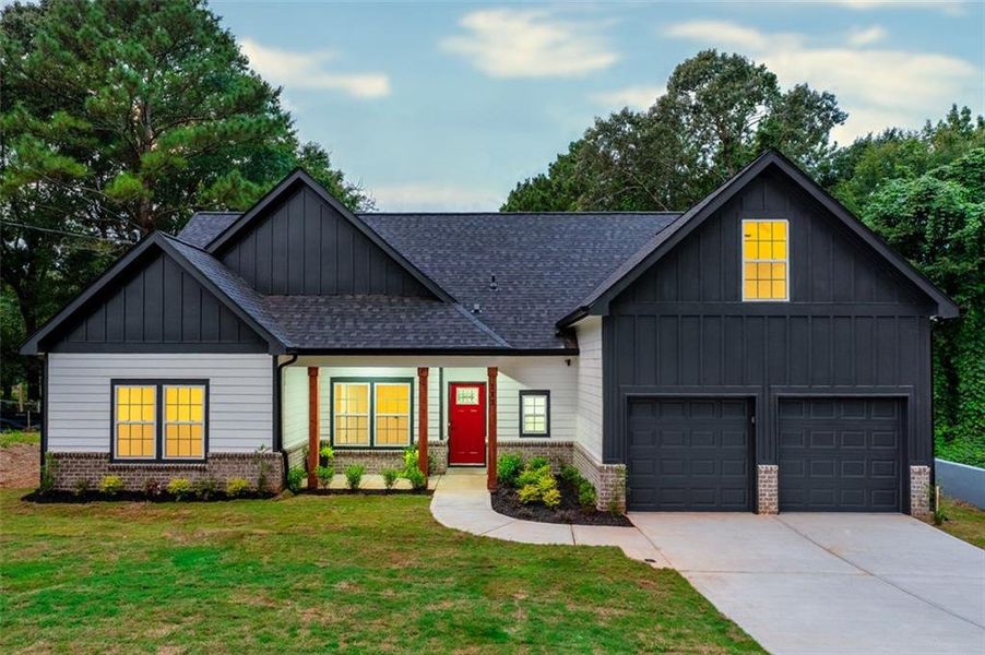 Front exterior of a new home in , Stockbridge, GA, highlighting curb appeal (Image 17).
