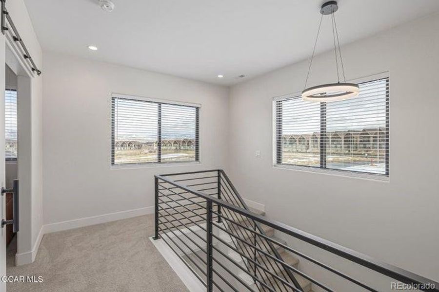 Spacious, unfurnished interior of a new home in , Granby (Image 25).