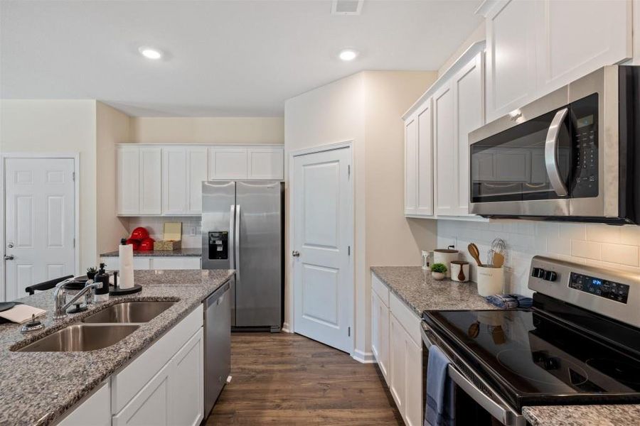 Furnished interior view inside a new home in Sheffield Highlands, Dallas (Image 5). Furnished interior view inside a new home in Sheffield Highlands, Dallas (Image 5).