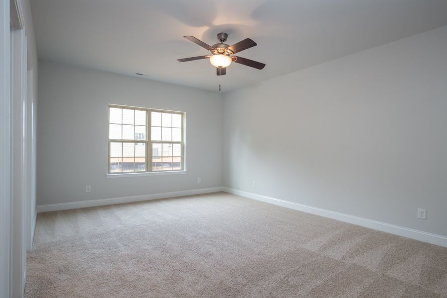 Representative unfurnished interior of a home built from the 3030 by Adams Homes in Parkland Place, Pace (Image 19).
