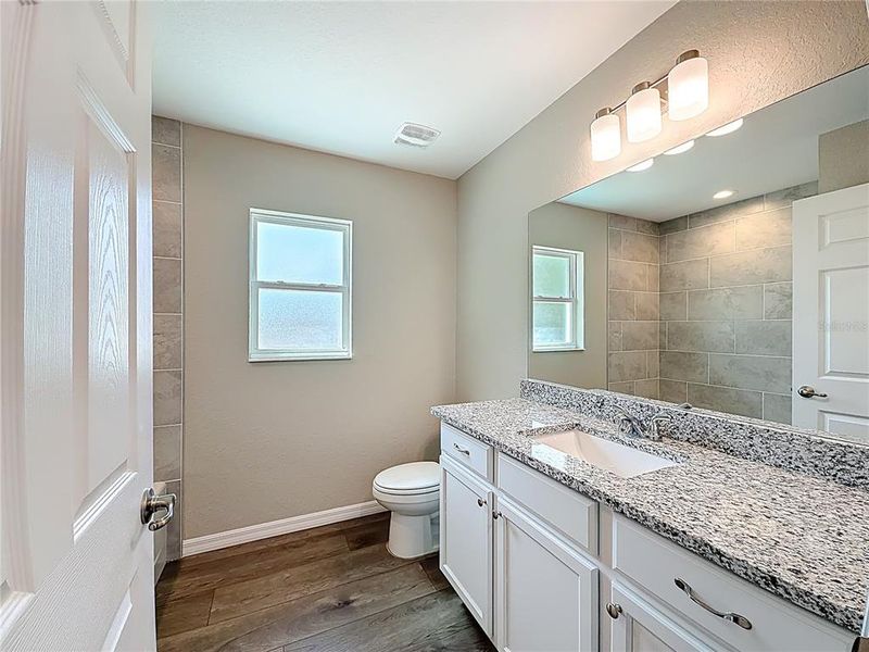Furnished interior view inside a new home in , Dunnellon (Image 9).