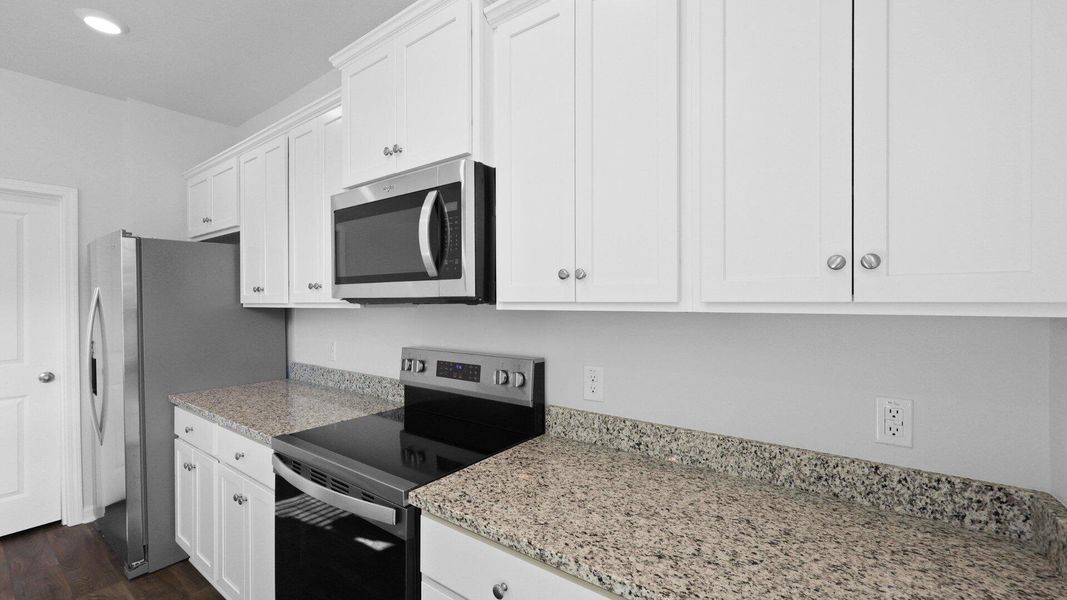 Furnished interior view inside a new home in The Ranch, Holly Hill (Image 6).