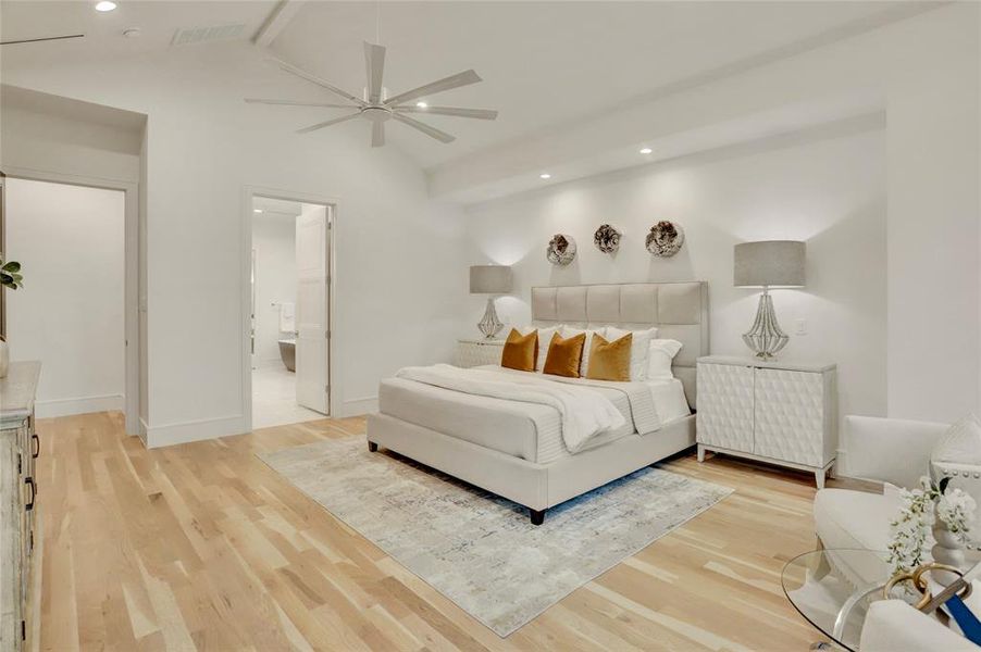 PRIMARY BEDROOM:  A truly executive feel in this oversized suite with 16’ cathedral ceilings with sitting area, and no less than four windows overlooking the back patio and yard. Once again, plank white oak flooring and detailed millwork.