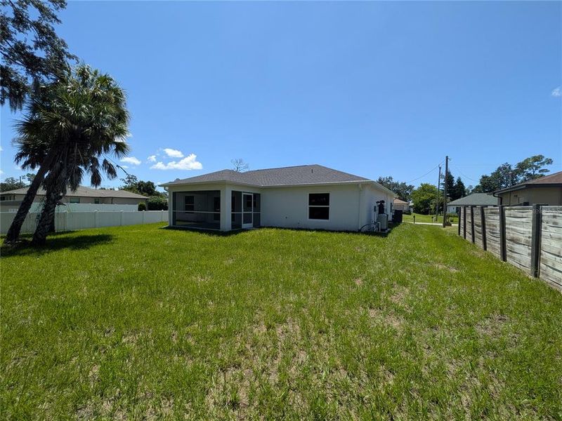 Exterior details and patio area of a home in , North Port (Image 23).