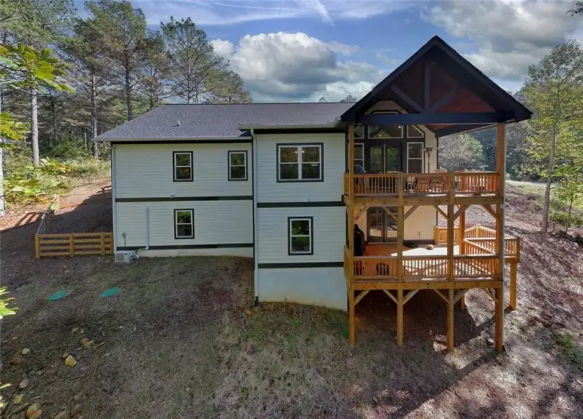 Exterior details and patio area of a home in , Ellijay (Image 26).