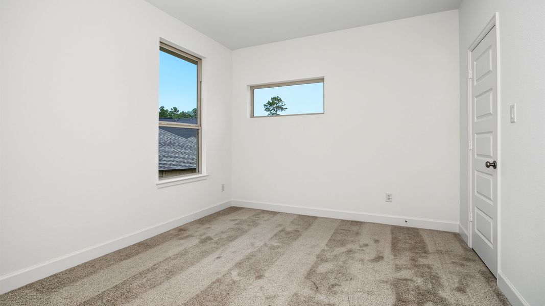 Spacious, unfurnished interior of a new home in The Woodlands Hills, Willis (Image 12).