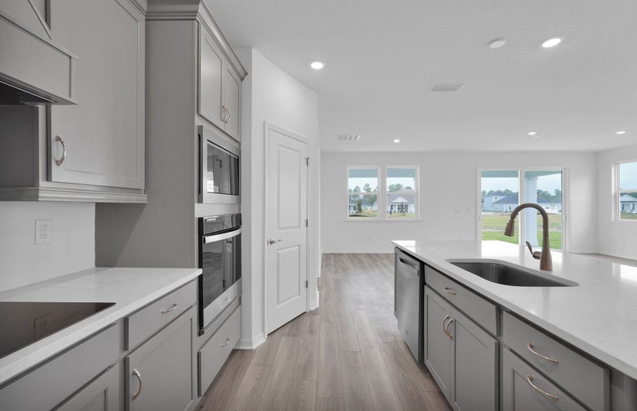 Furnished interior view inside a new home in Hyland Trail, Green Cove Springs (Image 7).
