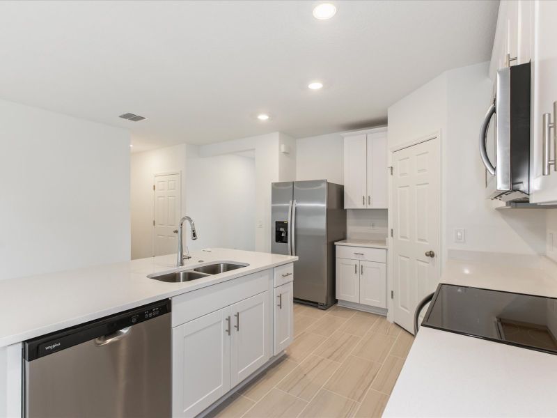 Kitchen in the Daphne floorplan at 2386 White Tail Street