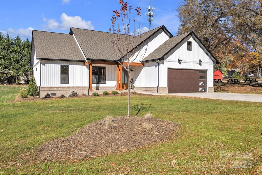 Front exterior of a new home in , Taylorsville, NC, highlighting curb appeal (Image 2). Front exterior of a new home in , Taylorsville, NC, highlighting curb appeal (Image 2).