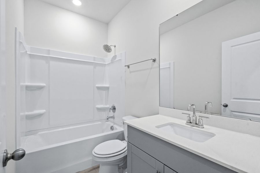 Furnished interior view inside a new home in Cypress Ridge - The Boardwalk Series, Longs (Image 11).