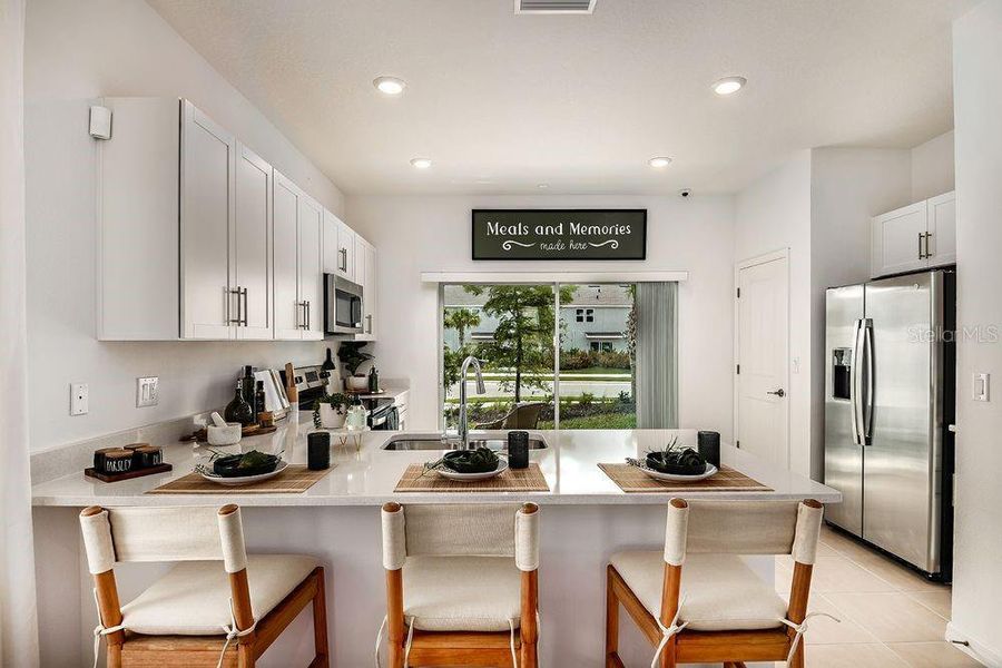 Furnished interior view inside a new home in The Townhomes at Skye Ranch, Sarasota (Image 11).