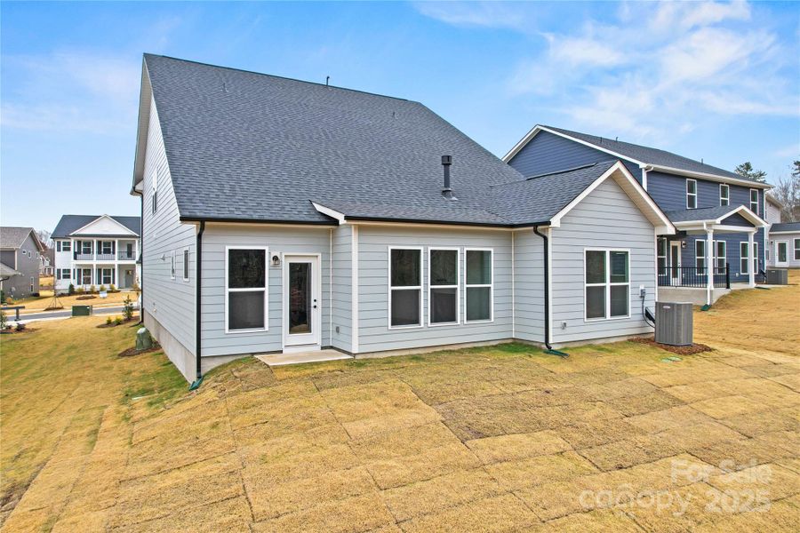 Exterior details and patio area of a home in Forest Creek, Waxhaw (Image 23).