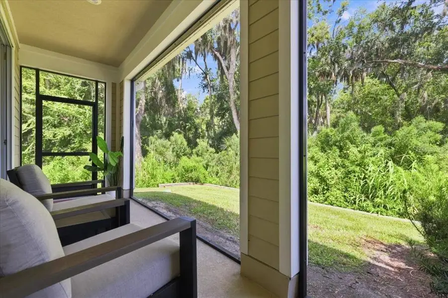 Exterior details and patio area of a home in Towns at Riverwalk, Sanford (Image 4). Exterior details and patio area of a home in Towns at Riverwalk, Sanford (Image 4).