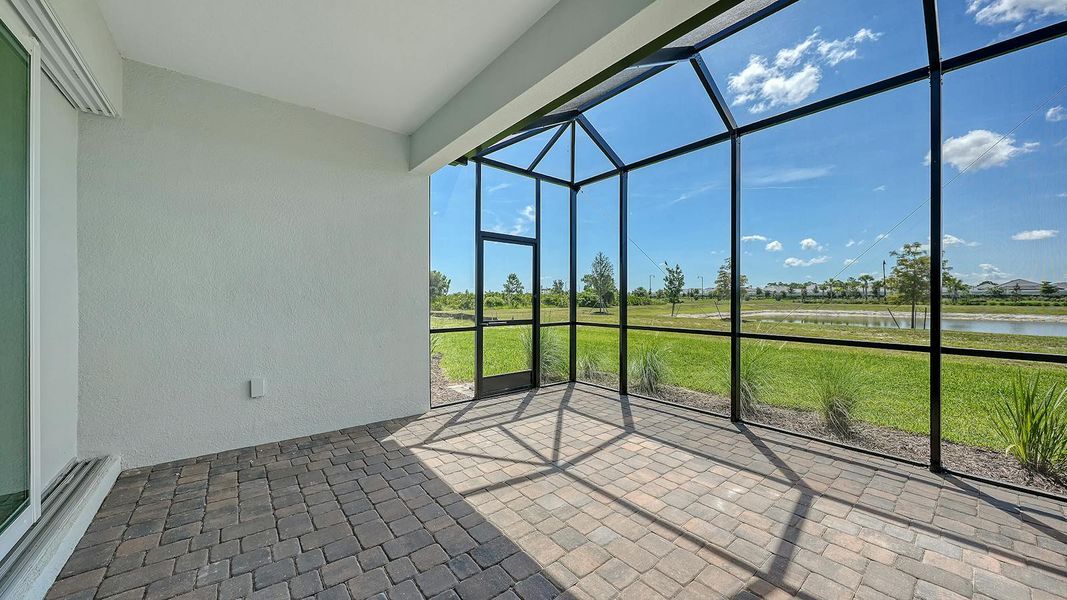 Exterior details and patio area of a home in Palmera Real Estate and Homes for Sale in Venice, FL - Neal Communities, Venice (Image 3). Exterior details and patio area of a home in Palmera Real Estate and Homes for Sale in Venice, FL - Neal Communities, Venice (Image 3).