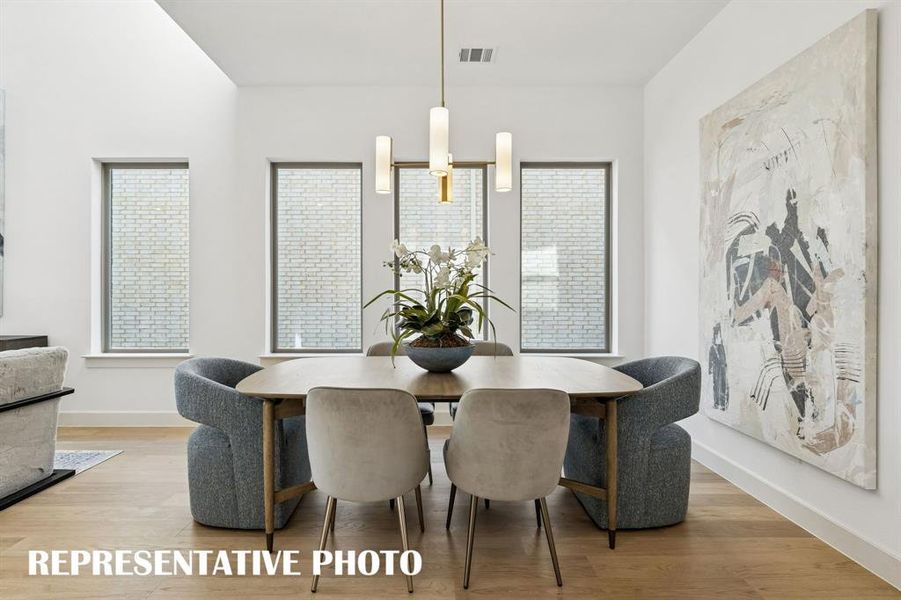 Whether it's lively dinner parties or cozy family gatherings, this dining room fits all occasions!  REPRESENTATIVE PHOTO