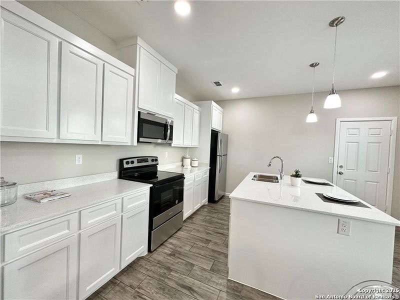 Furnished interior view inside a new home in , Alton (Image 8).