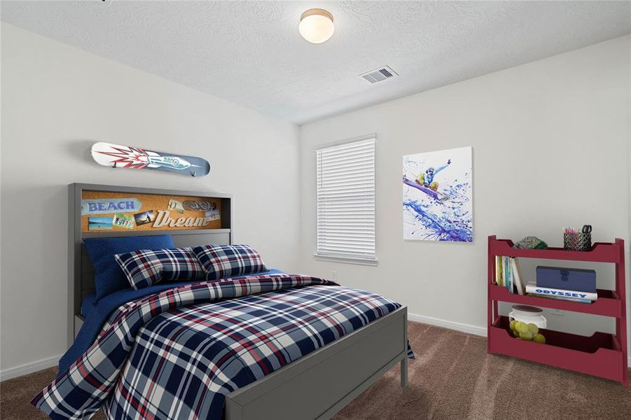 Secondary bedroom features plush carpet, neutral paint, lighting, large windows with privacy blinds and ample sized closet space.