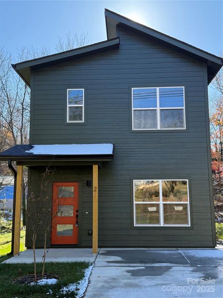 Front exterior of a new home in , Asheville, NC, highlighting curb appeal (Image 20).