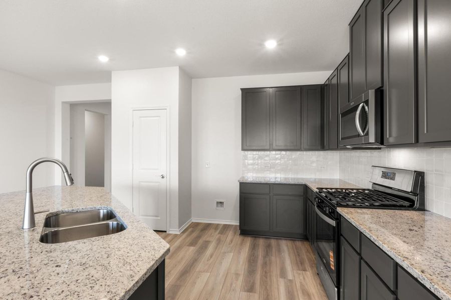 Furnished interior view inside a new home in Salerno - Classic Collection, Round Rock (Image 12).