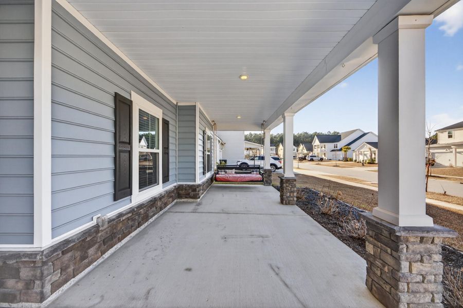 Exterior details and patio area of a home in Azalea Ridge at Summers Corner: Arbor Collection, Summerville (Image 3).