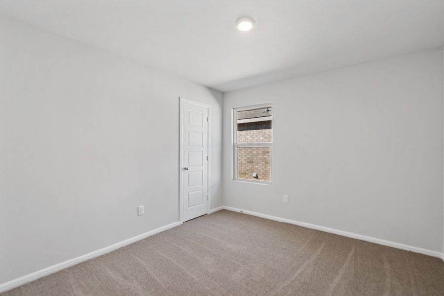 Representative unfurnished interior of a home built from the TEXAS CALI by D.R. Horton in Faculty Row, Abilene (Image 42).