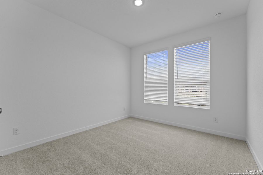 Spacious, unfurnished interior of a new home in Waterwheel: Coastline Collection, San Antonio (Image 14).