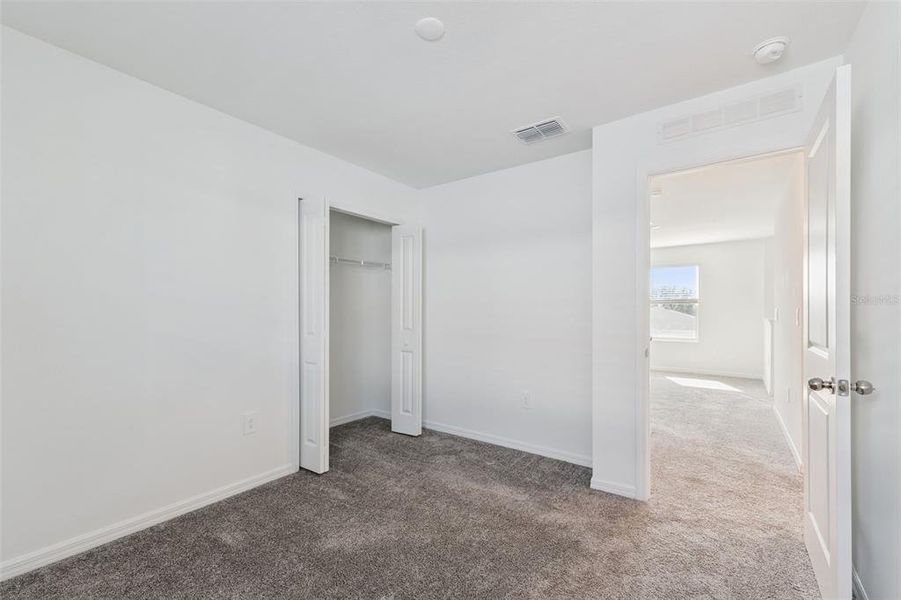 Spacious, unfurnished interior of a new home in Peace Creek Reserve: Legacy Collection, Winter Haven (Image 8). Spacious, unfurnished interior of a new home in Peace Creek Reserve: Legacy Collection, Winter Haven (Image 8).